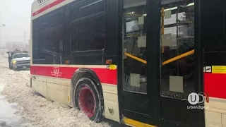 Spinning Tires - Will it make it ? TTC Artic Bus stuck in the snow