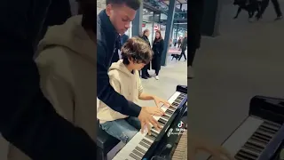 Playing Andrew Tate theme on the piano in public belike