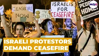 Israeli Protestors In Tel Aviv Demand Ceasefire Amid Ongoing Ground Invasion In Gaza