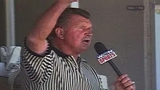 Mike Ditka sings during seventh inning stretch July 5 1998