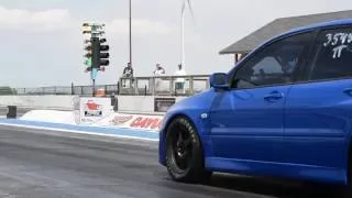 Mitsubishi Evolution VIII; 9 seconds 1/4 mile pass (9.95 @ 149.43 MPH)