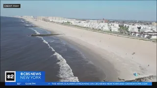 Rockaway Beach reopens after officials search for sharks