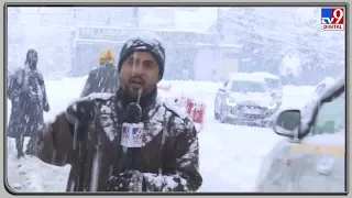 Heavy snowfall disrupts normal life in J&K