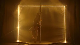 Young Sexy Slim Woman Pole Dancing