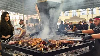 Italy Street Food Fairs. Huge Hexagonal Grill of Giants 'Fiorentina' Steak, Pork, Ribs & more