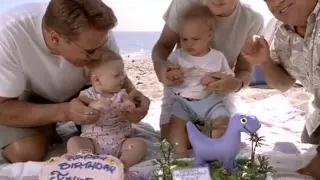 Arnold Schwarzenegger eats cake from a baby's foot