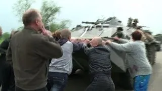 Shots fired as locals stand up to Ukraine troops in the east