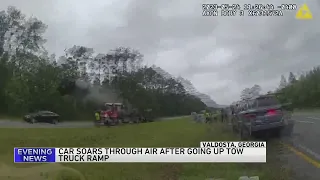 Car launches over tow truck in Georgia