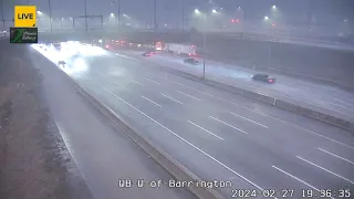 Cars shelter beneath underpass near Barrington