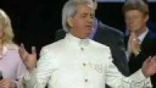 Benny Hinn sings "I STAND IN AWE OF YOU"