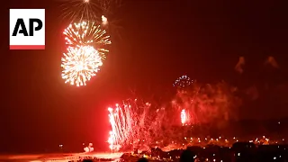 Fireworks across Normandy beachhead at start of commemorations for 80th anniversary of D-Day
