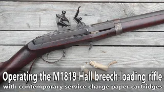 Operating the M1819 Hall breech loading flintlock rifle with authentic cartridges