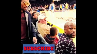 Manny Pacquiao and Floyd Mayweather meet again at the Laker's court side