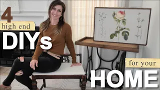 High End DIYs for Your Home • drop cloth curtains • end tables • art work • upholstered stool