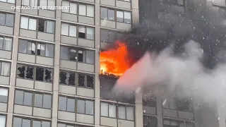 LIVE: Flames shoot out of Chicago high-rise