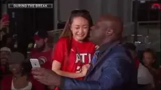 Shaquille O'Neal Kissing A Young Girl