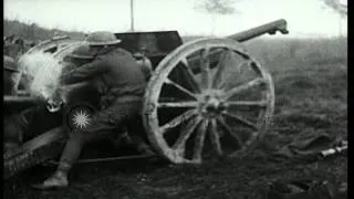 U.S. gunners of 130th Field Artillery clean and fire their field pieces during Wo...HD Stock Footage