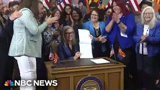 Arizona governor signs repeal of 1864 abortion ban