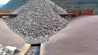 Barge unloading 3500 tons of cobblestone - my day job on the barge