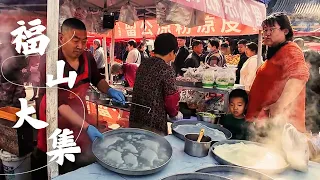 Palet kehidupan, keindahan Yantai: pasar yang ramai tempat sejarah dan makanan saling terkait.