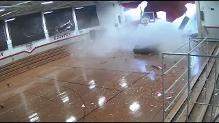 Students run for cover as strong winds tear the roof of school gym I ABC7