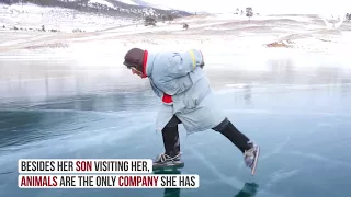Single old woman grandmother skating siberia baikal...