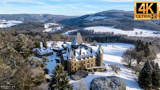 Castle of Froidcour with snow (Stoumont - Belgium) - Drone footage Ultra HD 4K