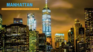 MANHATTAN - DOWNTOWN MANHATTAN NEW YORK CITY AT NIGHT BY DRONE - MANHATTAN SKYLINE - DRONE SHOTS