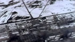 U.S. fighter aircraft strafing snow covered targets in Japan, during World War II HD Stock Footage