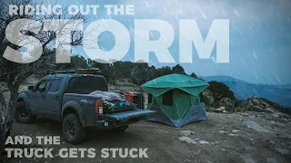 Solo trek riding out a storm in the tent & winching the truck