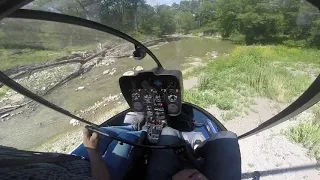 Landing R44 in a tight creek bed and then take off