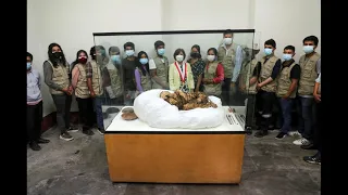 Ancient Peruvian mummy bound with ropes goes on display