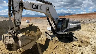 Caterpillar 375 Excavator Loading Trucks With Two Passes