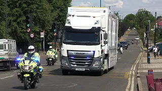 Police escort unmarked lorry