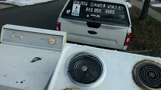 scrap metal pickup of a washing machine and dryer also a stove