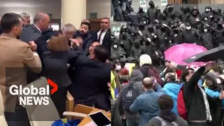 Georgia passes "foreign agents" bill: Lawmakers brawl, protesters clash at parliament