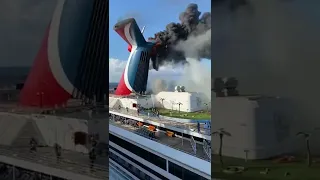 Carnival freedom - cruise ship funnel on fire