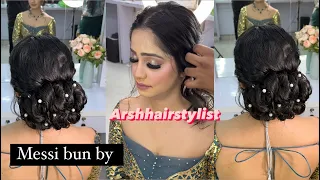 Messi bun with curls technique’ by Arshhairstylist watch on develop skil