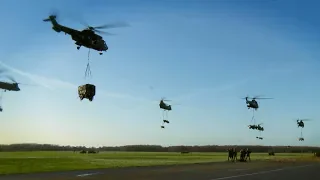 Aerial View of Sling Load Operations - CH-47 Chinook & Eurocopter AS532 Cougar Helicopters