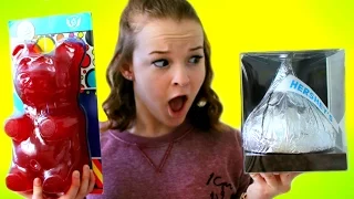 WORLD'S BIGGEST CANDY!  Giant Gummy Bear, Hershey's Kiss, Lollipop, & More! | Emma Monden