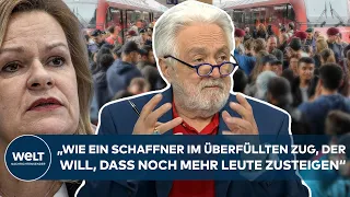 MIGRATION: „Wie ein Schaffner im überfüllten Zug, der will, dass noch mehr Leute zusteigen“