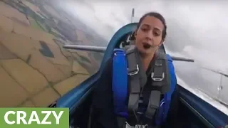 Female aerobatic pilot enduring negative G torture