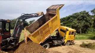 Ashok Leyland 1618 tipper truck and JCB working in bad road conditions