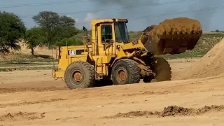 Cat 972M Wheel Loader Loading Trucks