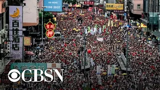 Hundreds of thousands of protesters march in Hong Kong against Chinese extradition bill