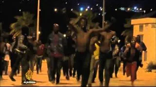 Hundreds of migrants storm into Spain