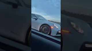 Porsche 992 Turbo S (stock) vs 2018 Audi R8 V10 Plus with exhaust only (no tune)