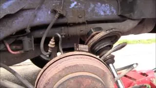 How to change a rear suspension strut