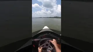 Driver’s view of a 300HP outboard drag boat in action