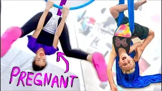 PREGNANT LADY DOES ACROBATS WITH CHILD!